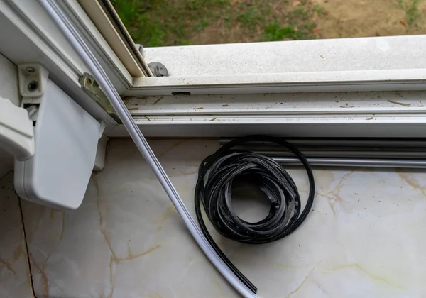 Replace rubber seal on window