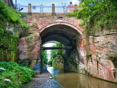 The 18th century, coursed red sandstone Northgate Street Bridge over the Shropshire Union Canal in Chester, Cheshire, UK. Perhaps by Thomas Telford, consultant engineer for the Chester Canal. clipart