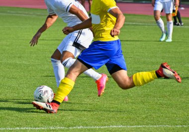 Futbol oyuncuları yaz zamanı iş başında