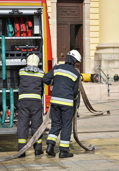 Firefighter at work in the city street