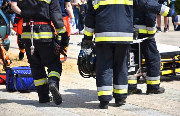 Firefighters at work outdoor in the street