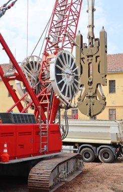Large crane and drill machinery at the contstruction site