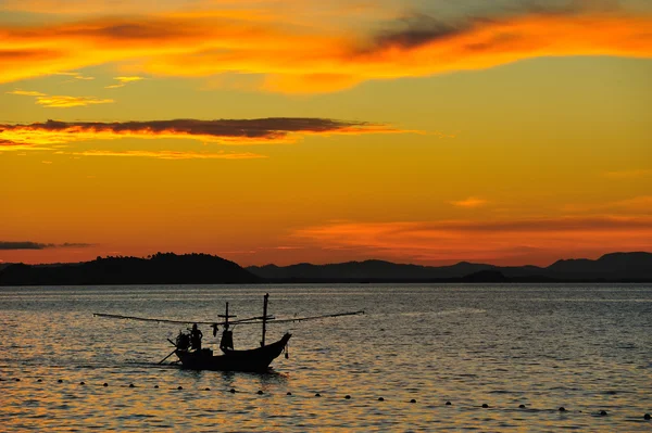 Fisherman boat with sunset — Stock Photo, Image