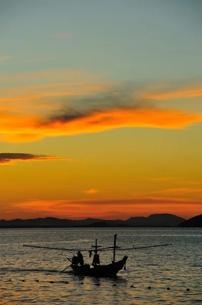 Fisherman boat with sunset — Stock Photo, Image