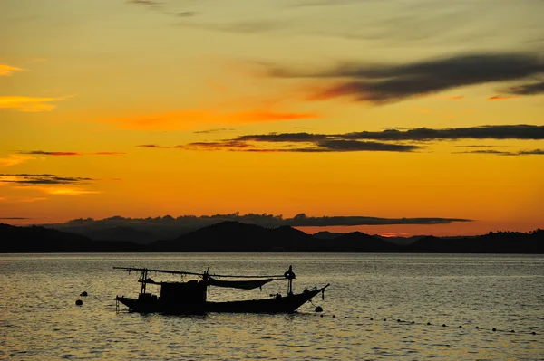 Fisherman boat with sunset — Stock Photo, Image