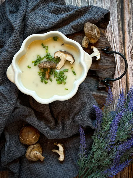 A bowl of mushroom soup. Vintage and rustic style