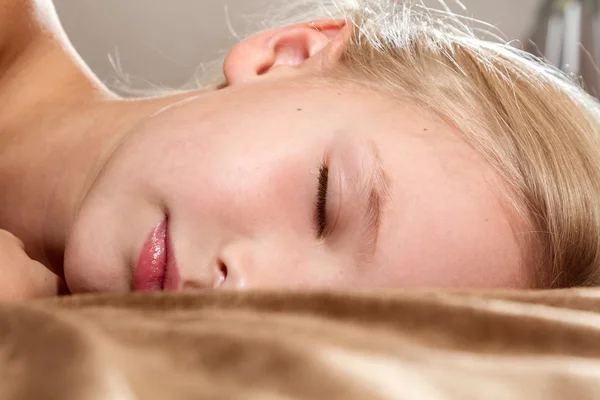 Beautiful little girl sleeping on bed — Stock Photo, Image