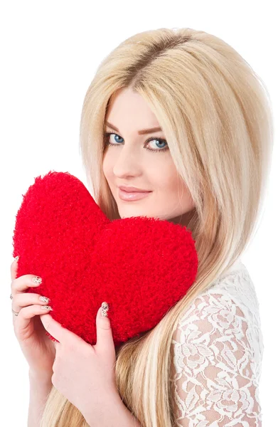 Beautiful blonde woman holding red heart — Stock Photo, Image
