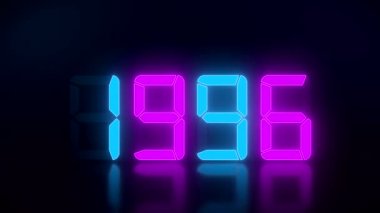 1990 'dan 2022' ye kadar devam eden mavi ve morumsu bir LED ekranın yansıtıcı bir zeminde görüntülenmesi 2022 yılının yeni yılını temsil etmektedir.