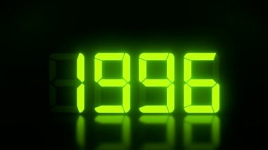 1990 'dan 2022' ye kadar devam eden yeşil renkli bir LED ekranın yansıtıcı bir zeminde görüntülenmesi - 2022 yılını temsil ediyor - tatil kavramı