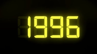 1990 'dan 2022' ye kadar devam eden koyu arkaplan üzerine sarı renkli bir LED ekranın video animasyonu 2022 yılını temsil ediyor - tatil kavramı