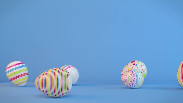 Mavi Arka Planda Yedi Renkli Boyanmış Paskalya Yumurtasının Video Animasyonu — Stok video