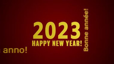 Bir kelime bulutunun kırmızı arkaplanda ve farklı dillerde mutlu bir yeni yıl mesajı içeren video animasyonu 2023 yılını temsil ediyor.