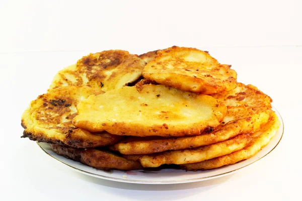 Cheese pancakes on a white background — Stock Photo, Image