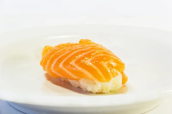 Sushi com um salmão — Fotografia de Stock