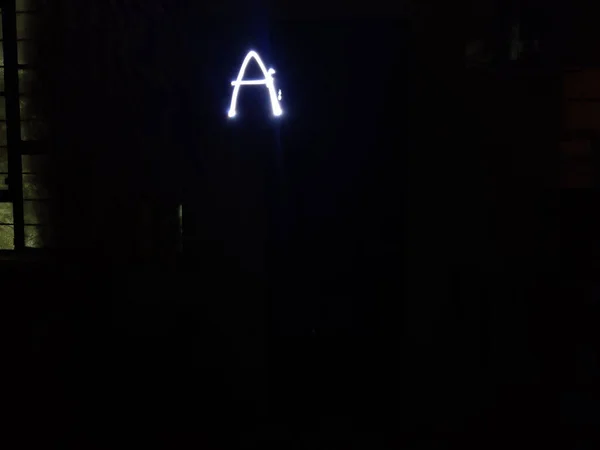 Зображення Алфавіту Написане Допомогою Ліхтарика Знятого Чорному Тлі Вночі Довга — стокове фото