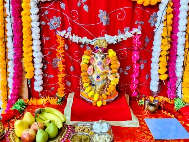 Jaipur, India Circa 2022: Picture of sculpture of Lord Ganesha. Outdoors daylight. Ganesh Chaturthi. Festival celebration