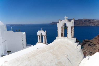 contemplating the wonderful views of mykonos and santorini