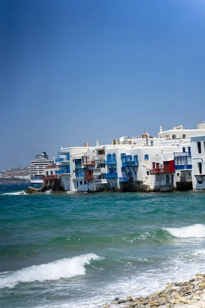 contemplating the wonderful views of mykonos and santorini