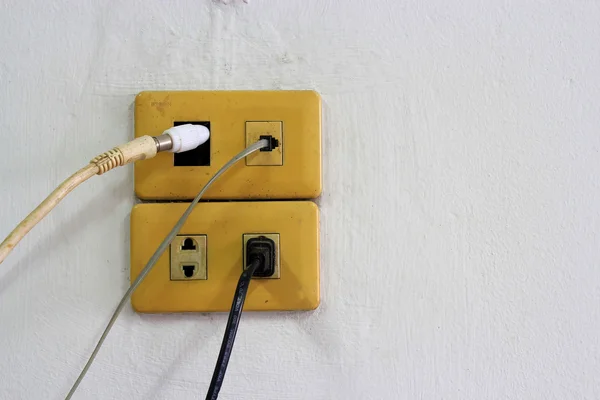 Closeup grunge light switch on dirty  wall — Stock Photo, Image