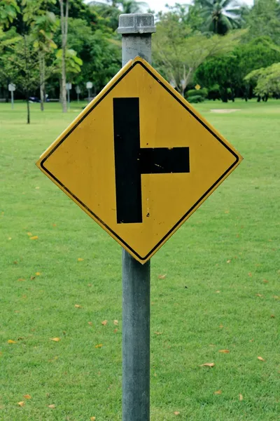 Yellow road signs, traffic signs on nature background — Stock Photo, Image