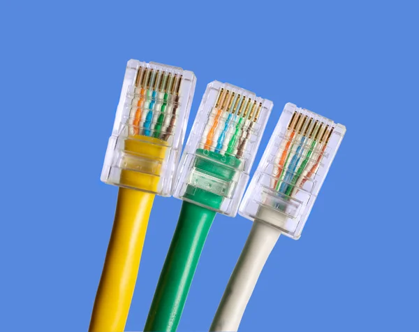 Cables Trenzados Multicolores Con Rj45 Sobre Fondo Azul Espacio Copia — Foto de Stock