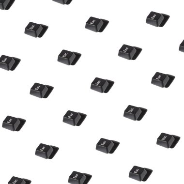 black esc button on white background pattern. top view.