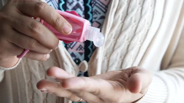 Young women using hand sanitizer with copy space — Stock Video