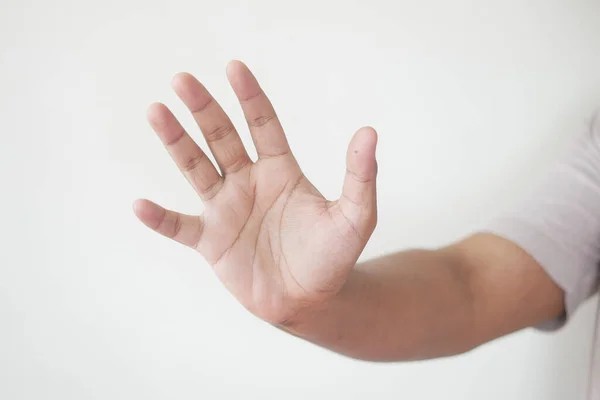 Junger Mann zeigt aufhören Seufzer isoliert auf weiß — Stockfoto