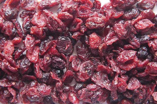 Detalhe tiro de cranberries secas na mesa — Fotografia de Stock