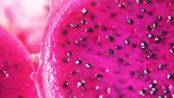 Slice of dragon fruit on a chopping board. — Stock Video