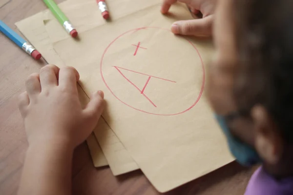 Hand papier met hand getekend rang met plus in cirkel — Stockfoto