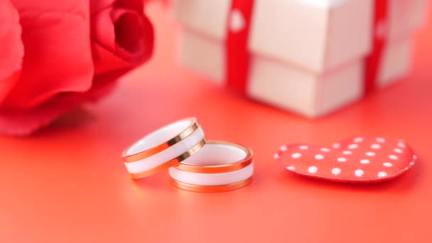 Wedding ring on a red background close up — 图库视频影像