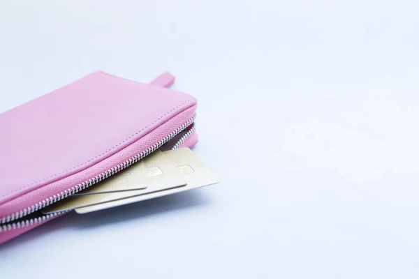 Stock image close up of credit cards in a wallet on white background 