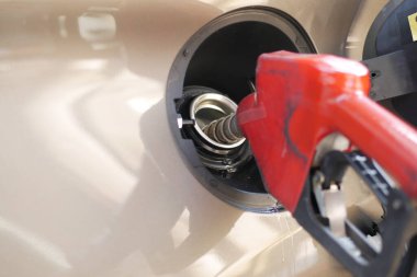  car refueling at the gas station close up 