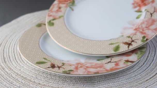 Putting empty plate on table — Vídeo de Stock