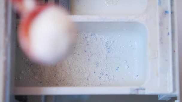 Pouring Washing powder in plastic tray of washing machine — Stock Video