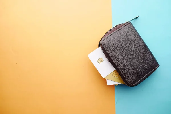 Close up of credit cards in a wallet on wooden background — Stock Photo, Image