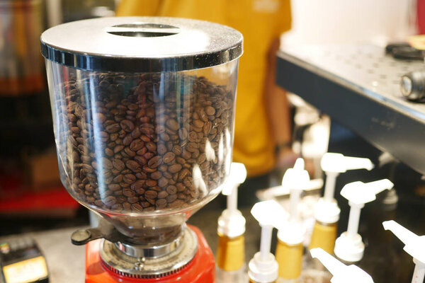 coffee beans in a glass container in a cafe 