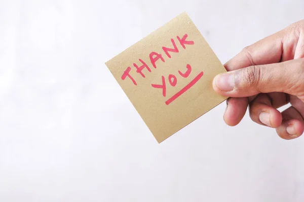 Hand holding thank you note with copy space — Foto de Stock