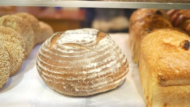 Baked pastry with glass window in the bakery , — Video Stock