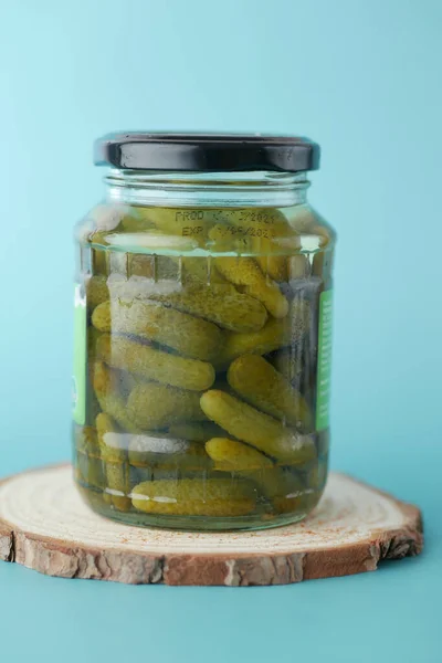 Bottle of pickled cucumbers, pickles on table —  Fotos de Stock