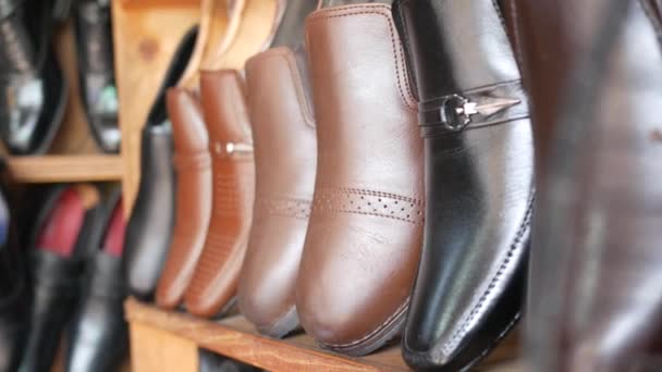 Shoes display for sale at local store — Stock Video