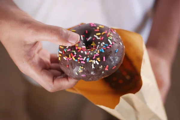 Hand Hand Mit Donuts — Stockfoto