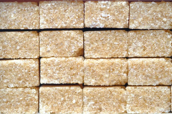 Zbliżenie Brązowej Kostki Cukru Stole — Zdjęcie stockowe