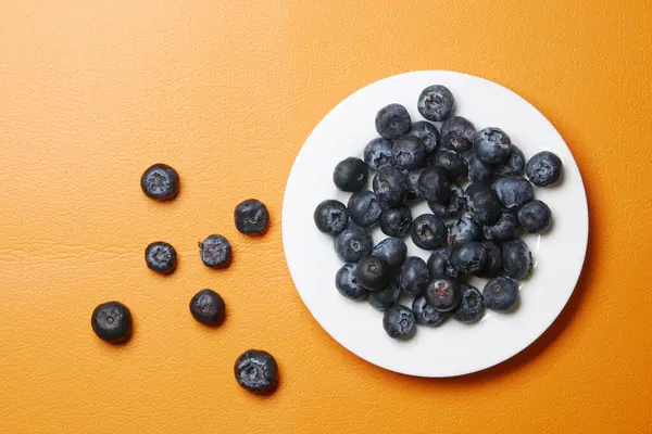 Top View Fresh Blue Berry Orange Background — Stock Photo, Image