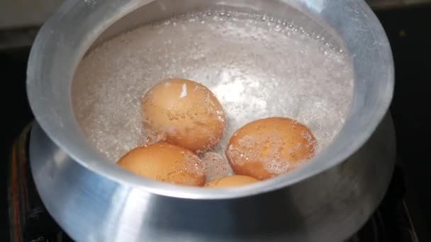 Boiling Egg Shot Water Top View — Stockvideo