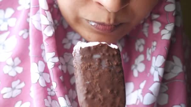 Young Women Eating Chocolate Flavor Ice Cream — Stok video