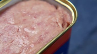 close up of canned meat on table ,