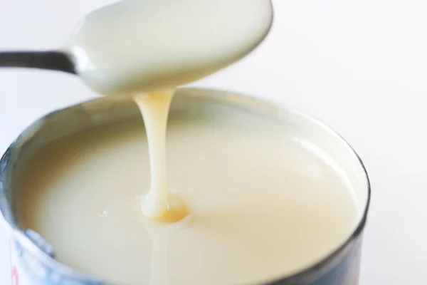 condensed milk in a bowl close up